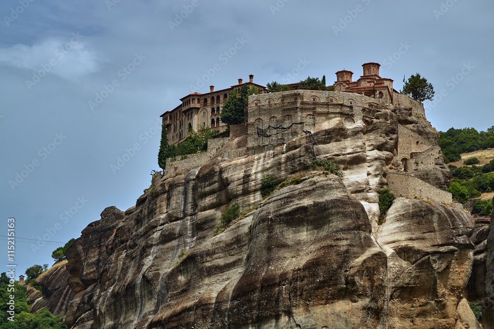 The Orthodox medieval monastery on top rock Meteora. The Orthodox medieval monastery on top rock Meteora.
