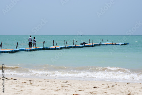 colorful plastic dock with sea background at Khaolak Thailand photo