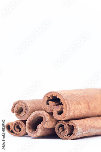 Cinnamon sticks isolated over white background