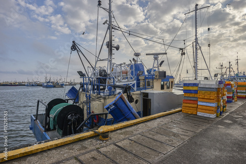 Baltic Sea, Fishing Boats in a Harbour, on board boxes for loading fish
