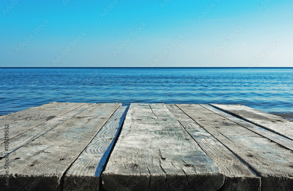 old wooden desk space and sea old wooden desk space and sea