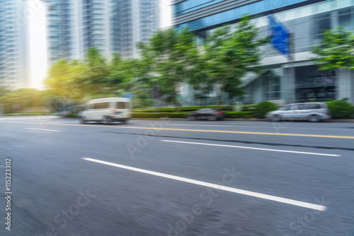 car driving on city road © kalafoto
