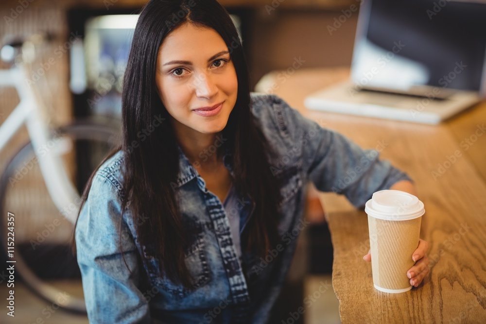 Portrait of woman having coffee Portrait of woman having coffee