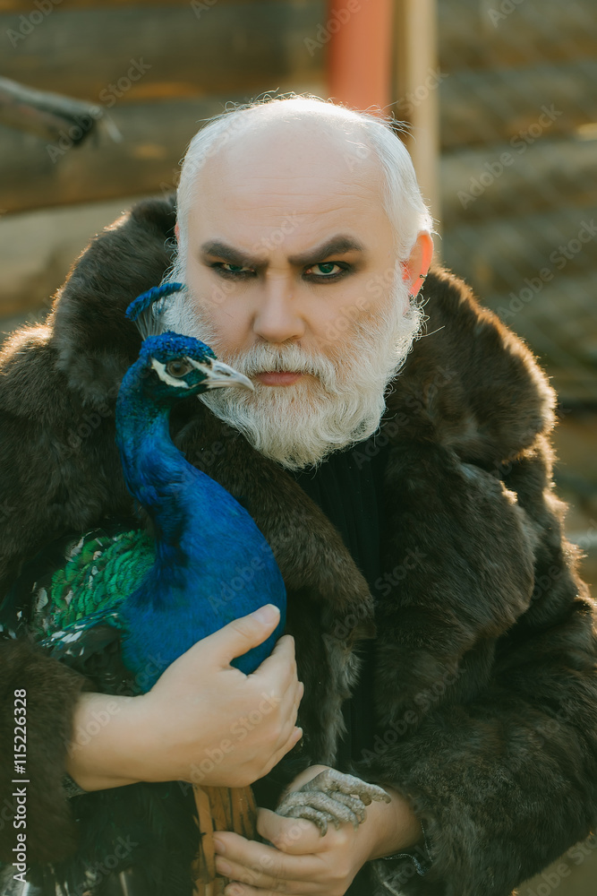 bearded man with peacock bearded man with peacock