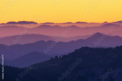 pattern of distant mountain layers at sunset