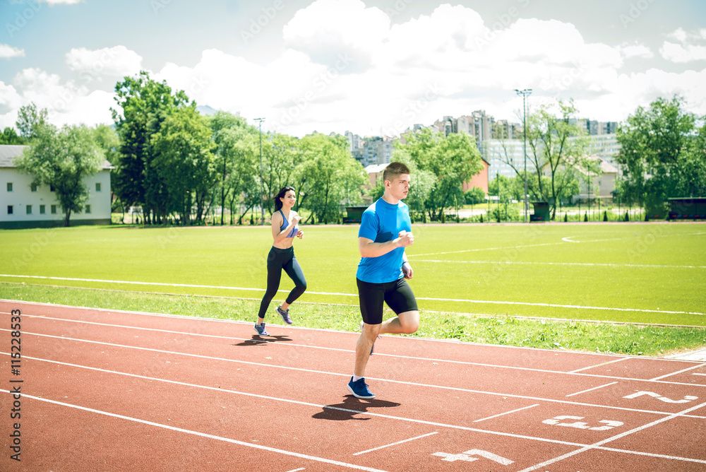 Obraz premium Running couple outdoors.