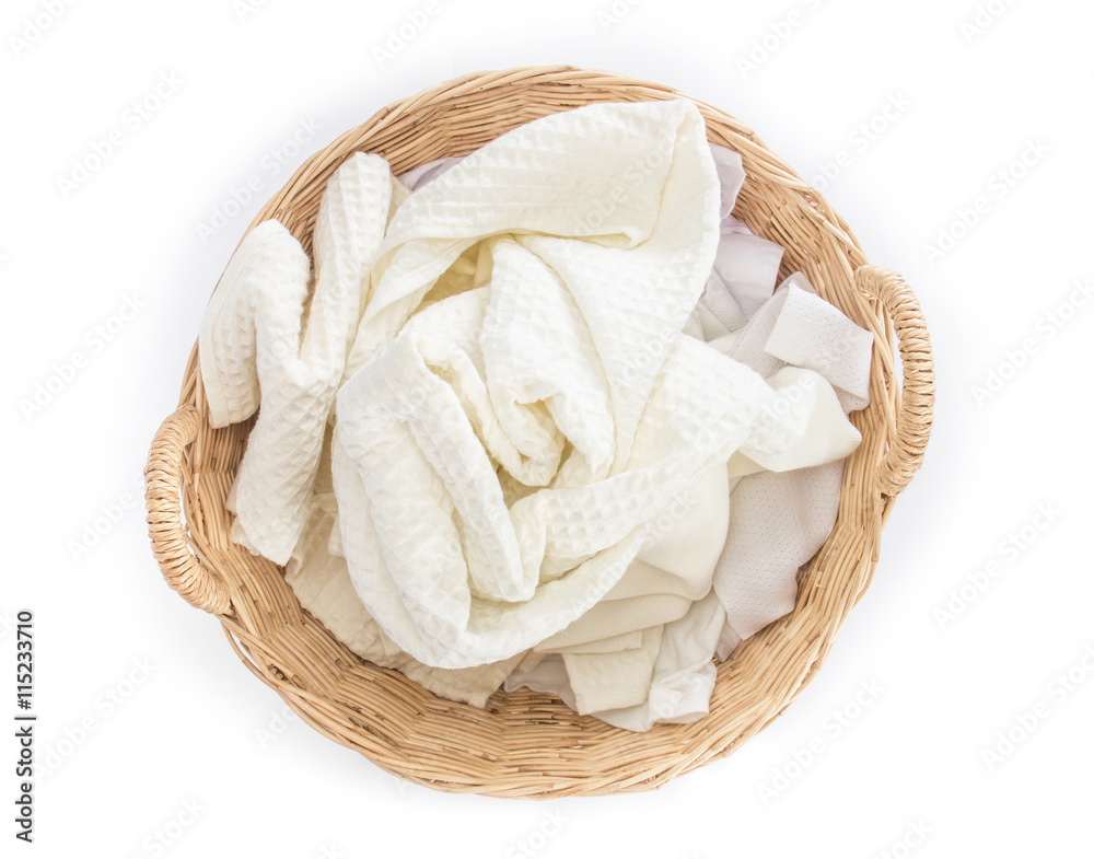 white towel and cloth in the wicker baskets on white background