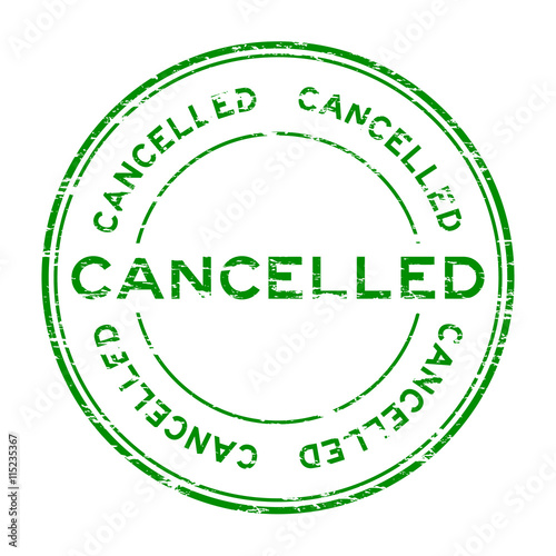 Grunge round green cancelled stamp on white background