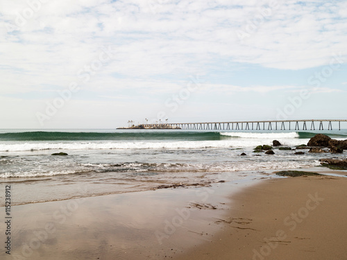 Oil field and causeway, La Conchita, California, USA
