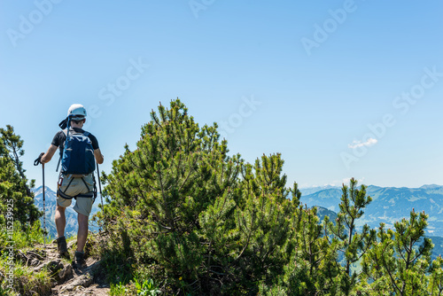 Man hiking or trekking in the alps