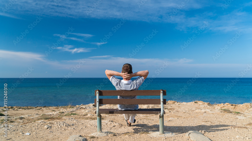 Man relaxing at a sea