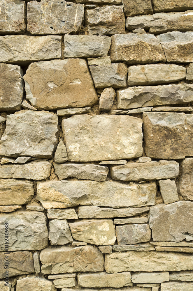 Fototapeta premium Old stone wall closeup