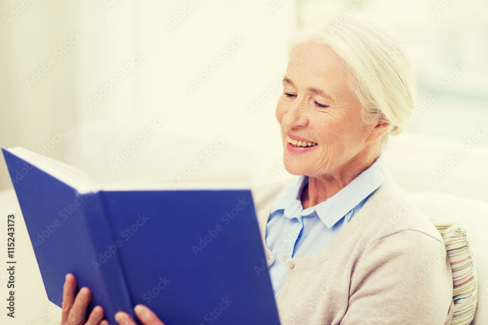 happy smiling senior woman reading book at home happy smiling senior woman reading book at home