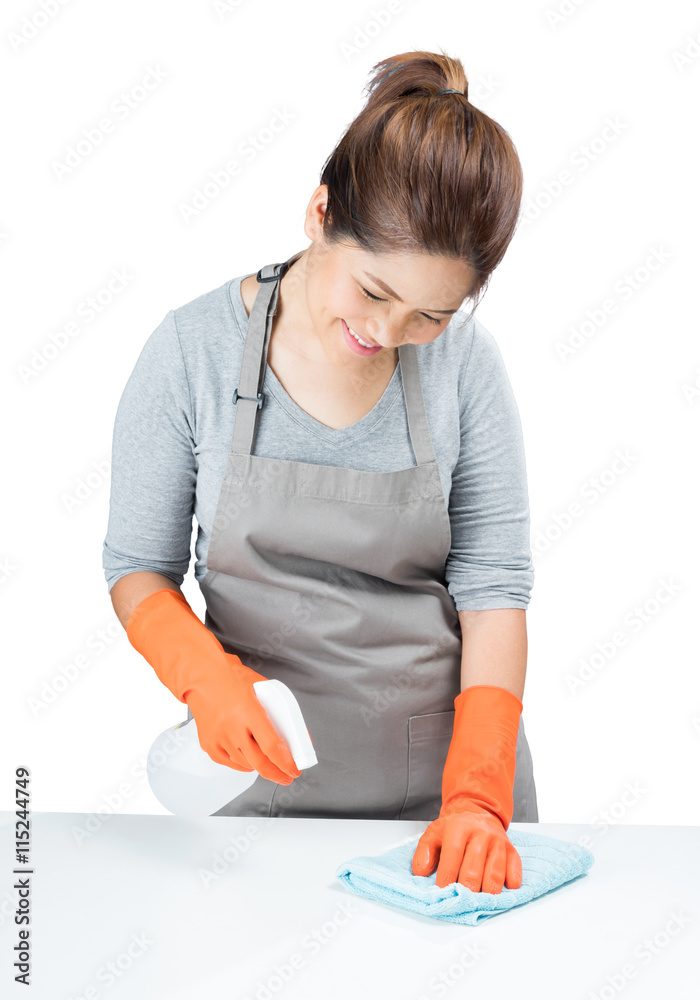 Naklejka premium asian housewife sweeping on table