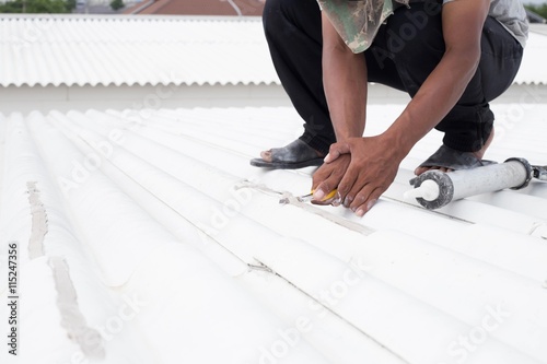 Roof leak and crack repair with caulking gun