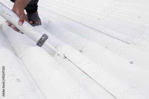 Roof leak and crack repair with caulking gun