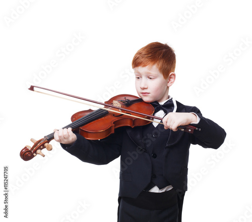 Cute redhead child boy plays violin isolated at white background