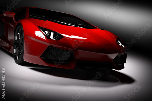 Red fast sports car in spotlight, black background. Shiny, new, luxurious.