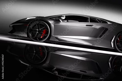 Obraz Szary szybki samochód sportowy w centrum uwagi, czarne tło. Błyszczący, nowy, luksusowy.