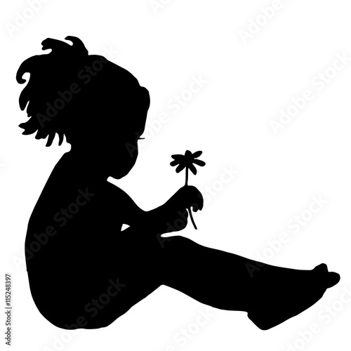 Silhouette of a child with chamomile