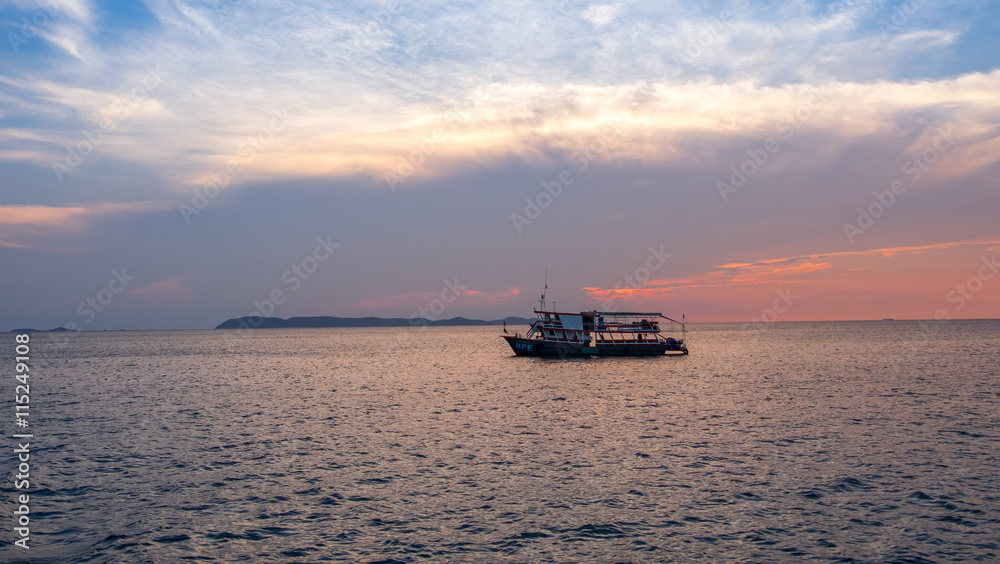 sunset with boat at pattaya at thailand