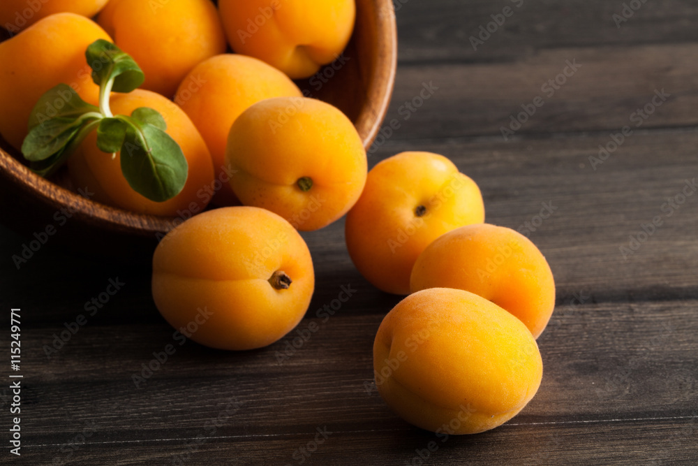 Fresh apricots on wooden background Fresh apricots on wooden background