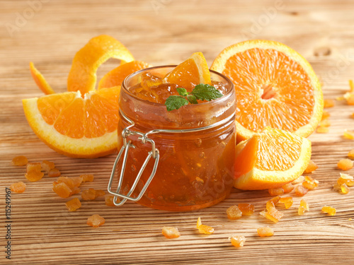  orange jam on wooden background
