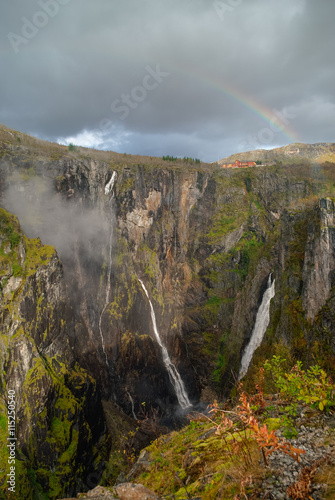 Rainbow over the famous Voringsfossen waterfalls near Hardangervidda, Norway