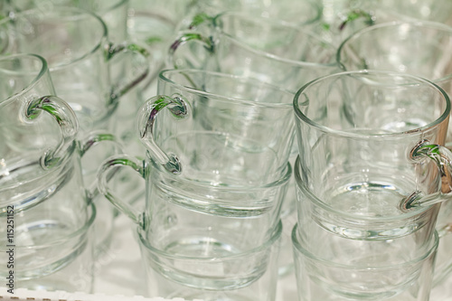 Glass transparent mug close-up. A lot of.