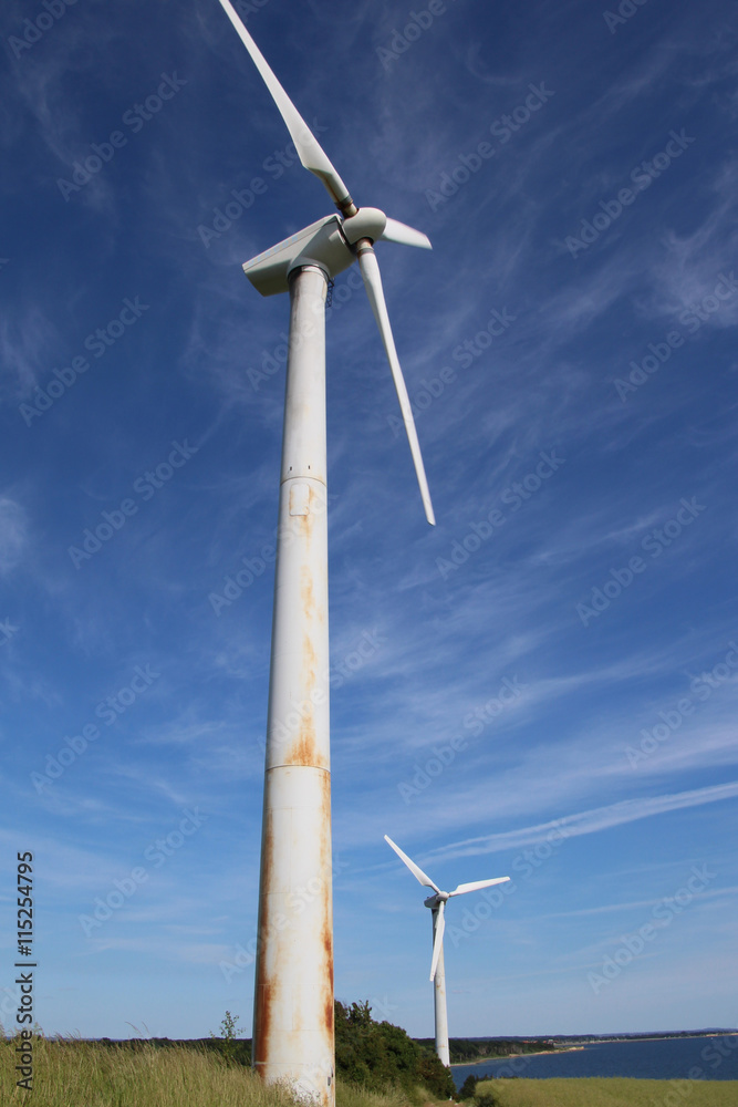Windmill close to the sea on a warm summerday Windmill close to the sea on a warm summerday
