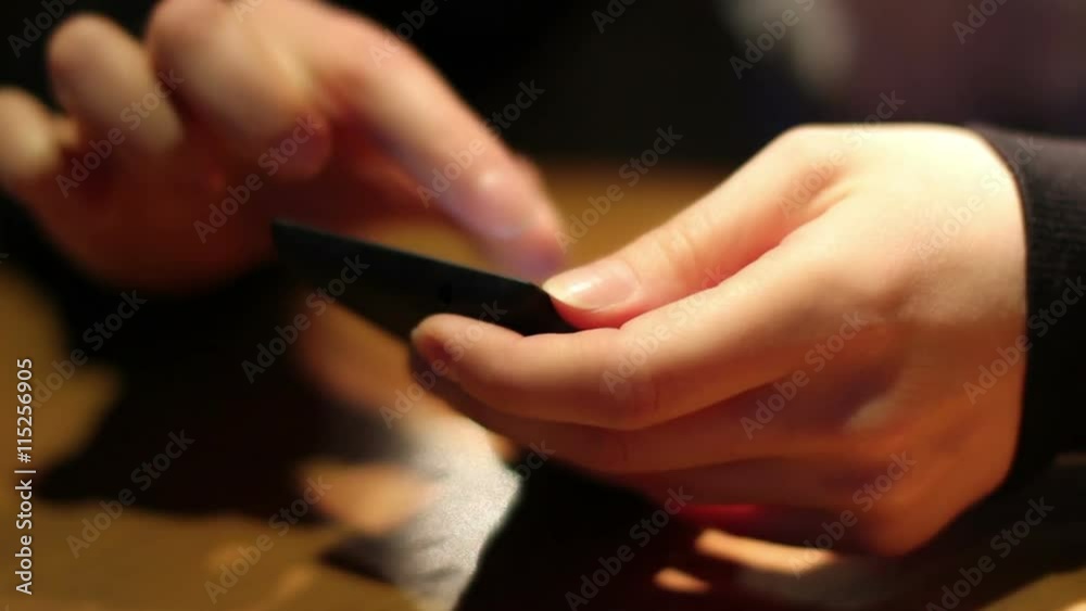 hand woman using smartphone in cafe hand woman using smartphone in cafe