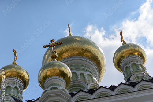 Golden domes with crosses photo