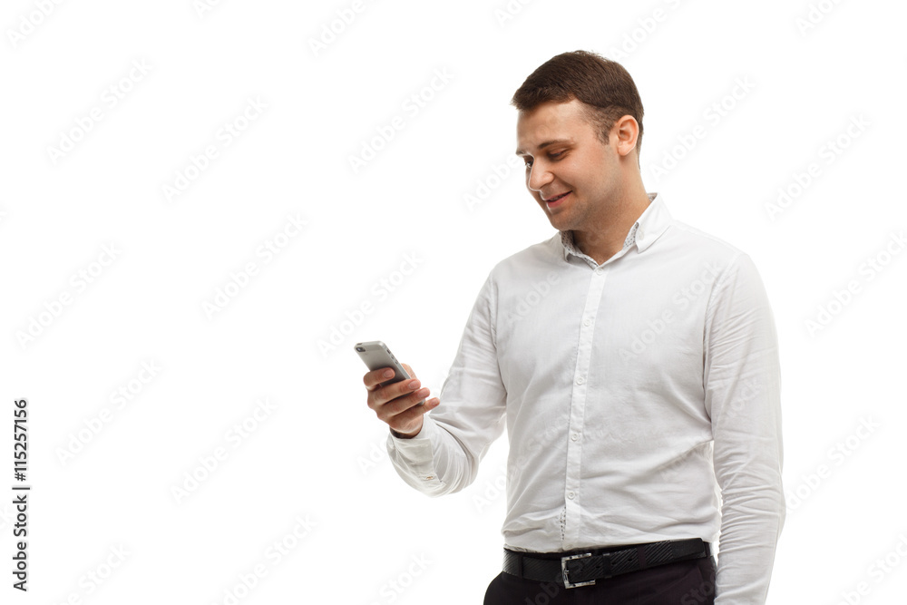 Businessman using his phone isolated on white