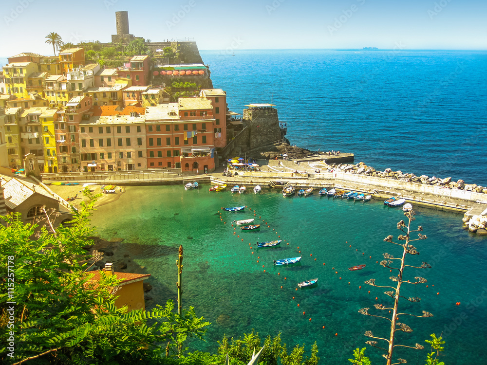 Panoramic View of Vernazza at sunset, one of the jewels of Cinque Terre National Park, Unesco Heritage. Liguria, Italy.