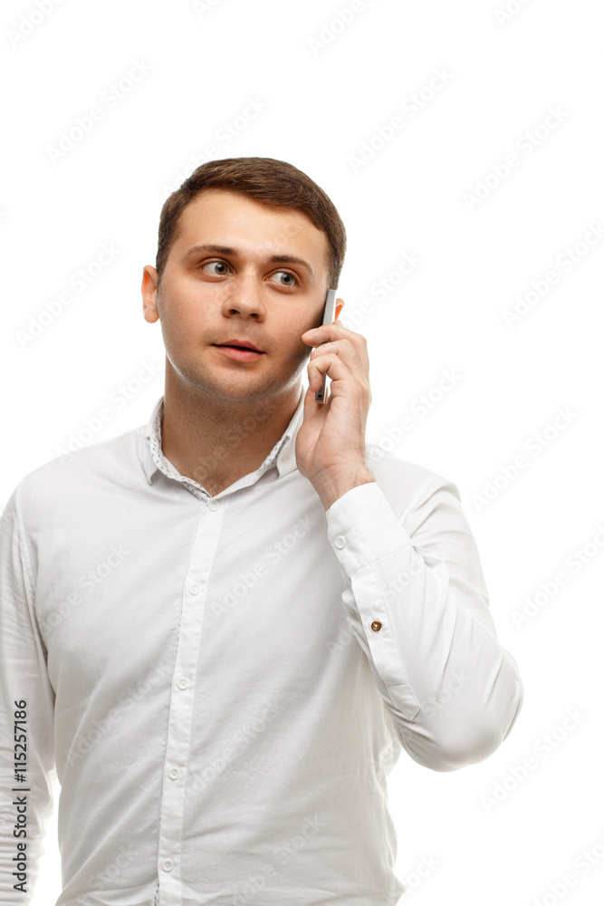 Handsome businessman talking phone isolated