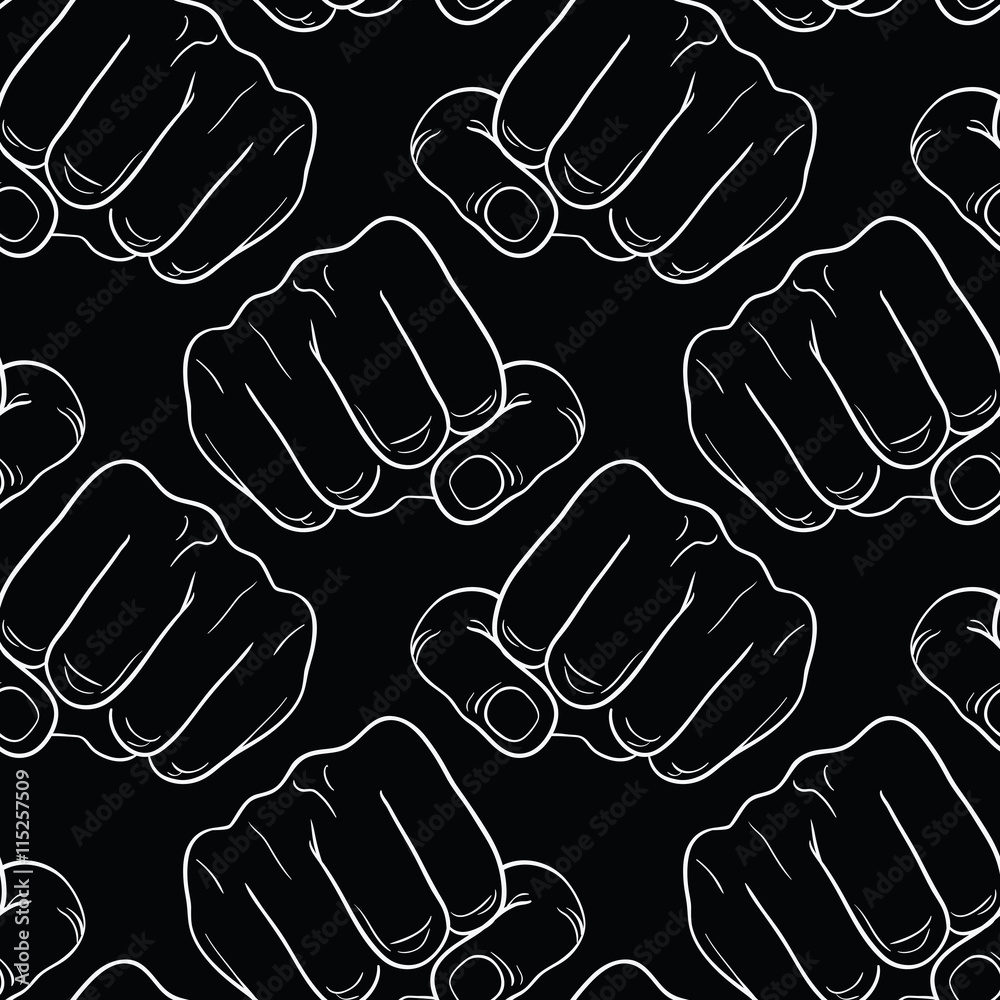 Raised fist. Strong fist on a black seamless background. Mans hand