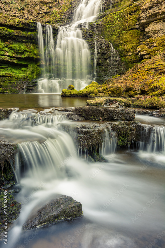 Fototapeta premium Flowing waterfall Scaleber Force in the Yorkshire Dales National Park, UK.