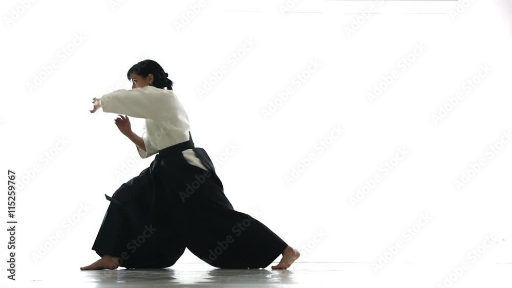 beautiful woman holds a kung fu 