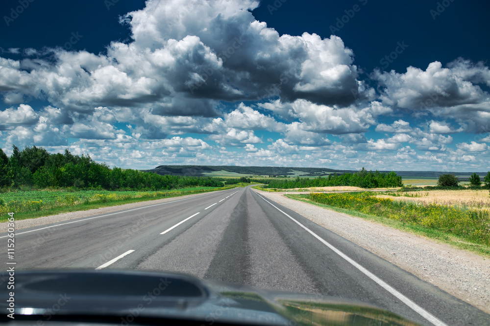 Empty asphalt road at daytime. Beautiful nature landscape