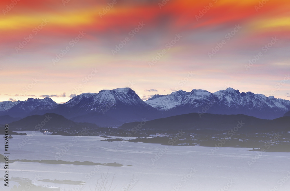 Winter morning in Norway. Sunrise over mountains