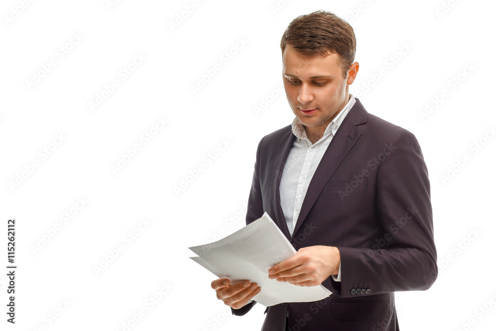 Handsome businessman in suit with papers Handsome businessman in suit with papers