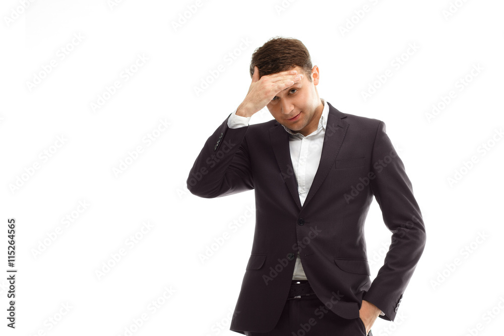 Handsome businessman put hand on forehead Handsome businessman put hand on forehead