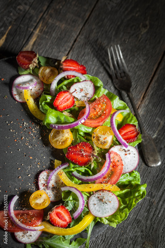 Fresh vegetable salad on a slate board