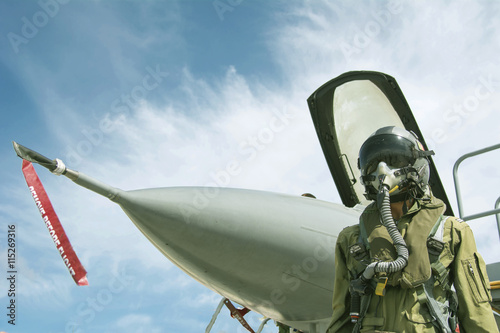 Pilot with suit and militar...