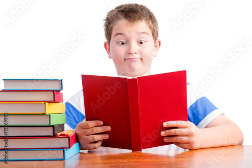 Young surprised elementary schoolboy