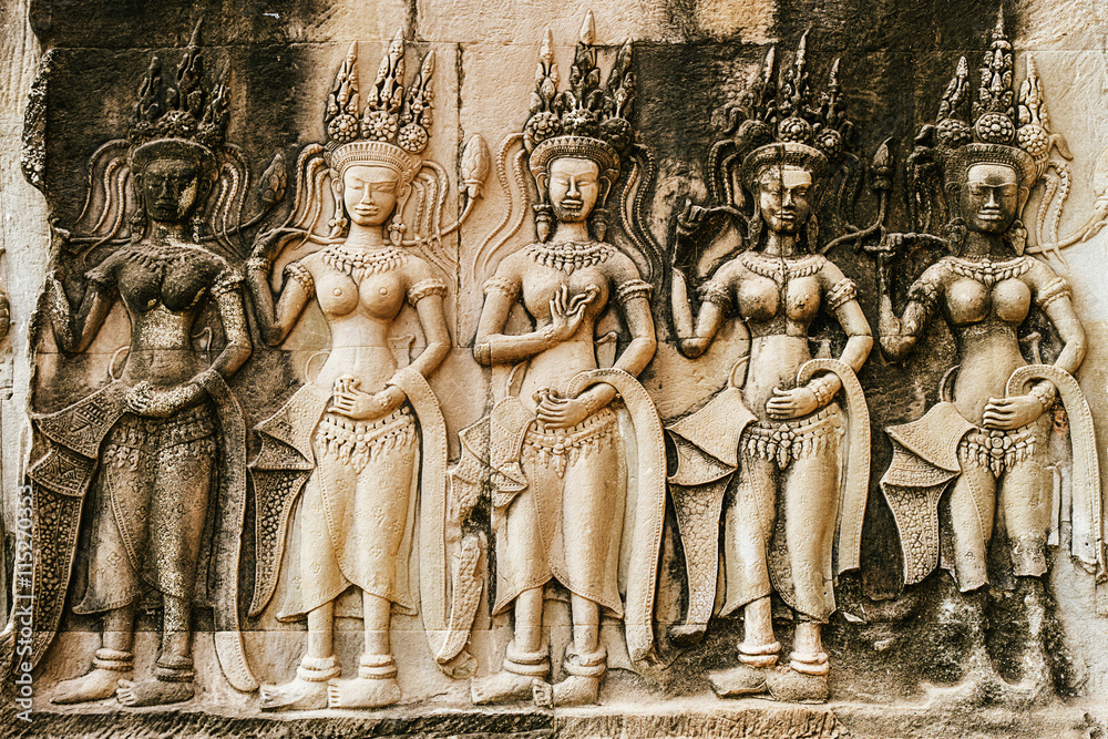 Apsara sculpture on the wall of Angkor Wat, Seam Reap, Cambodia. Apsara sculpture on the wall of Angkor Wat, Seam Reap, Cambodia.