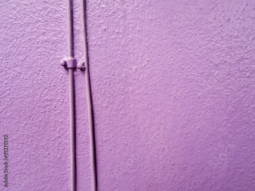 Telephone wiring on the purple wall