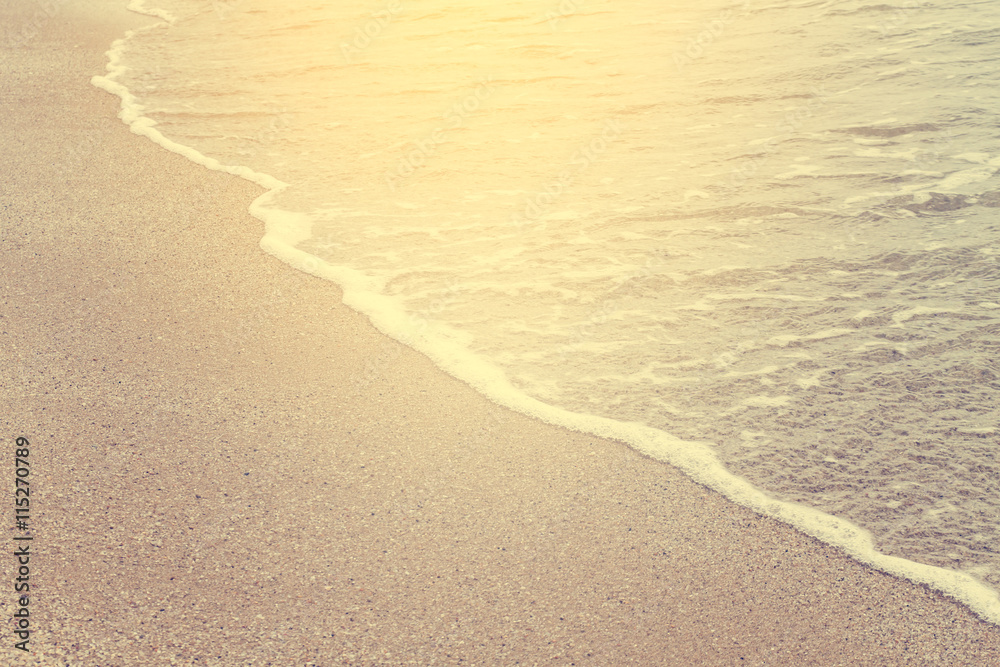 close up soft wave on sand at the beach in vintage style close up soft wave on sand at the beach in vintage style