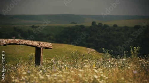 Essentuki Kislovodsk Russia. Panorama of summer field in mountains covered by greenery. Landscape. Fence. Nature. photo