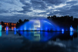 Night magic show of fountains on the central waterfront Roshen